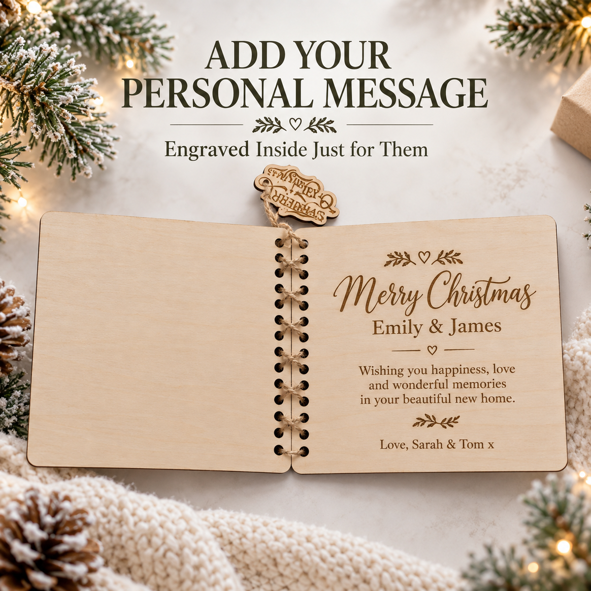 Open wooden Christmas card showing a personal message engraved inside, Merry Christmas with custom names and wishes for their new home