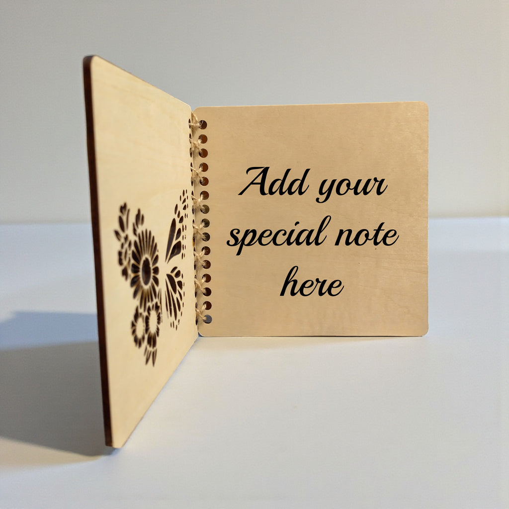 Inside of personalised wooden birthday card showing space for custom message, butterfly wildflower design,