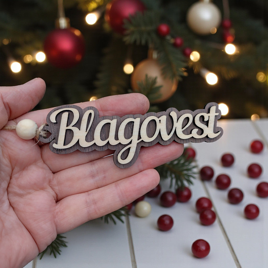 Handmade wooden name ornament with layered design and natural wood tones – perfect Christmas gift tag
