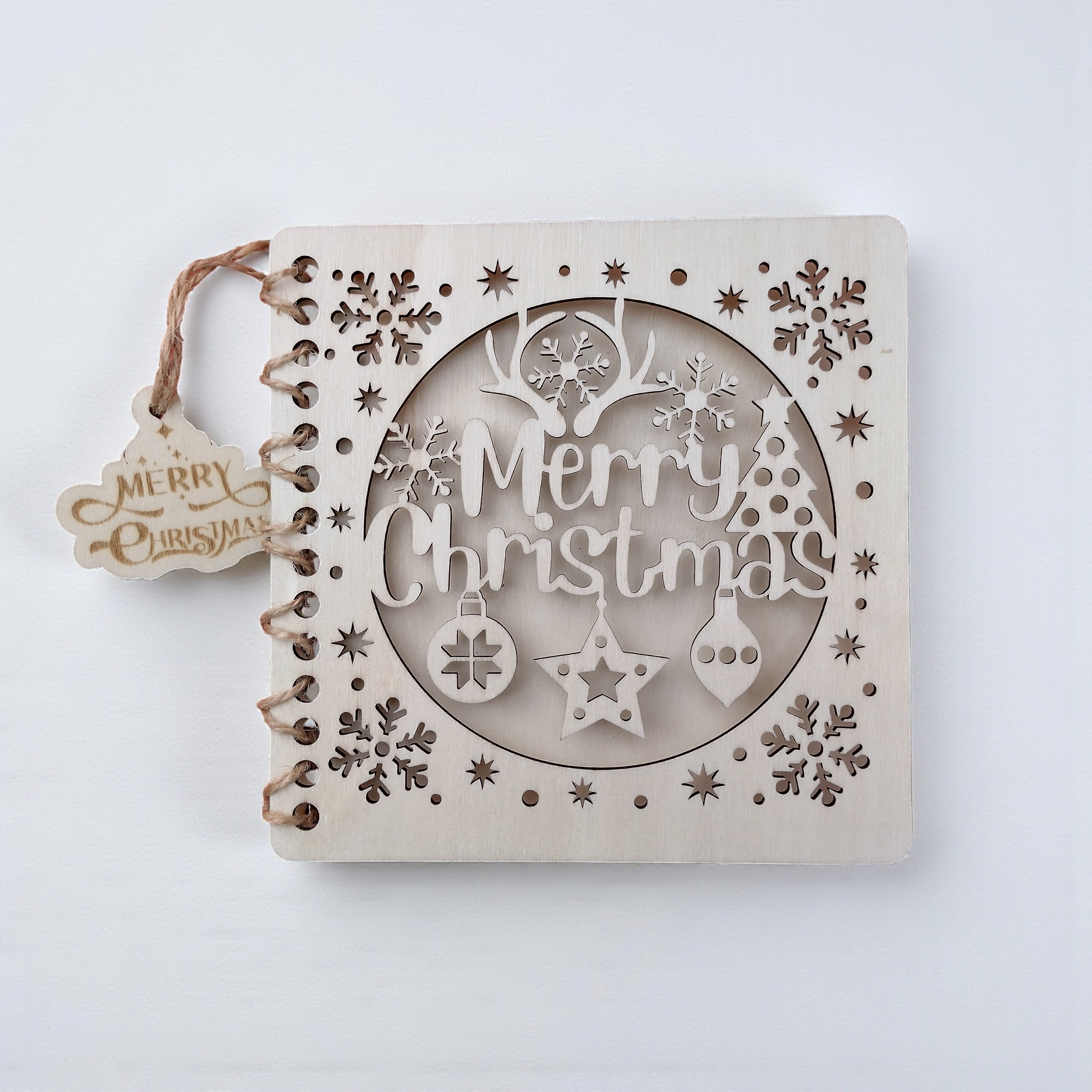 Handmade wooden Christmas card with laser-cut “Merry Christmas” design, eco-friendly birch wood, perfect personalized holiday gift.