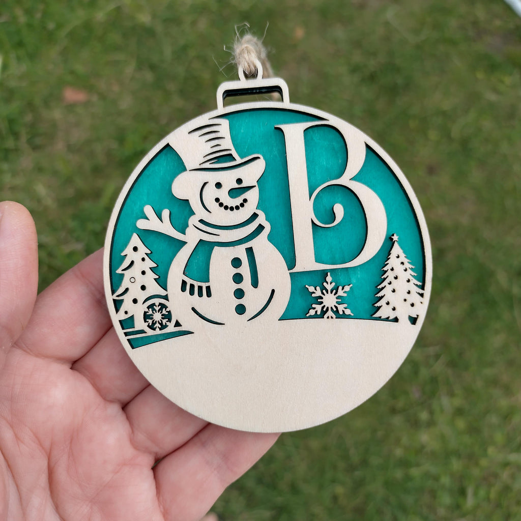 Personalized Snowman Christmas Ornament—Custom Initial Laser Cut Bauble, Wooden Xmas Tree Decoration, Gift Tag Idea - product photo 4