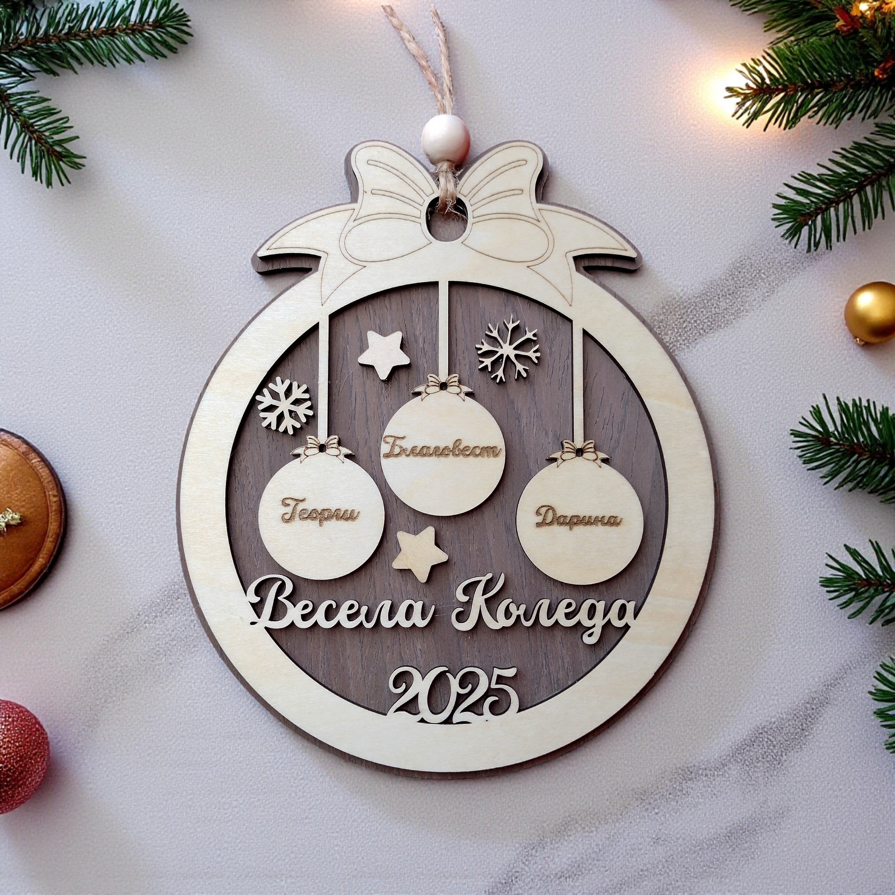 Personalised wooden family Christmas ornament 2025 with engraved names and snowflake decorations – handmade by CraftRay Gifts