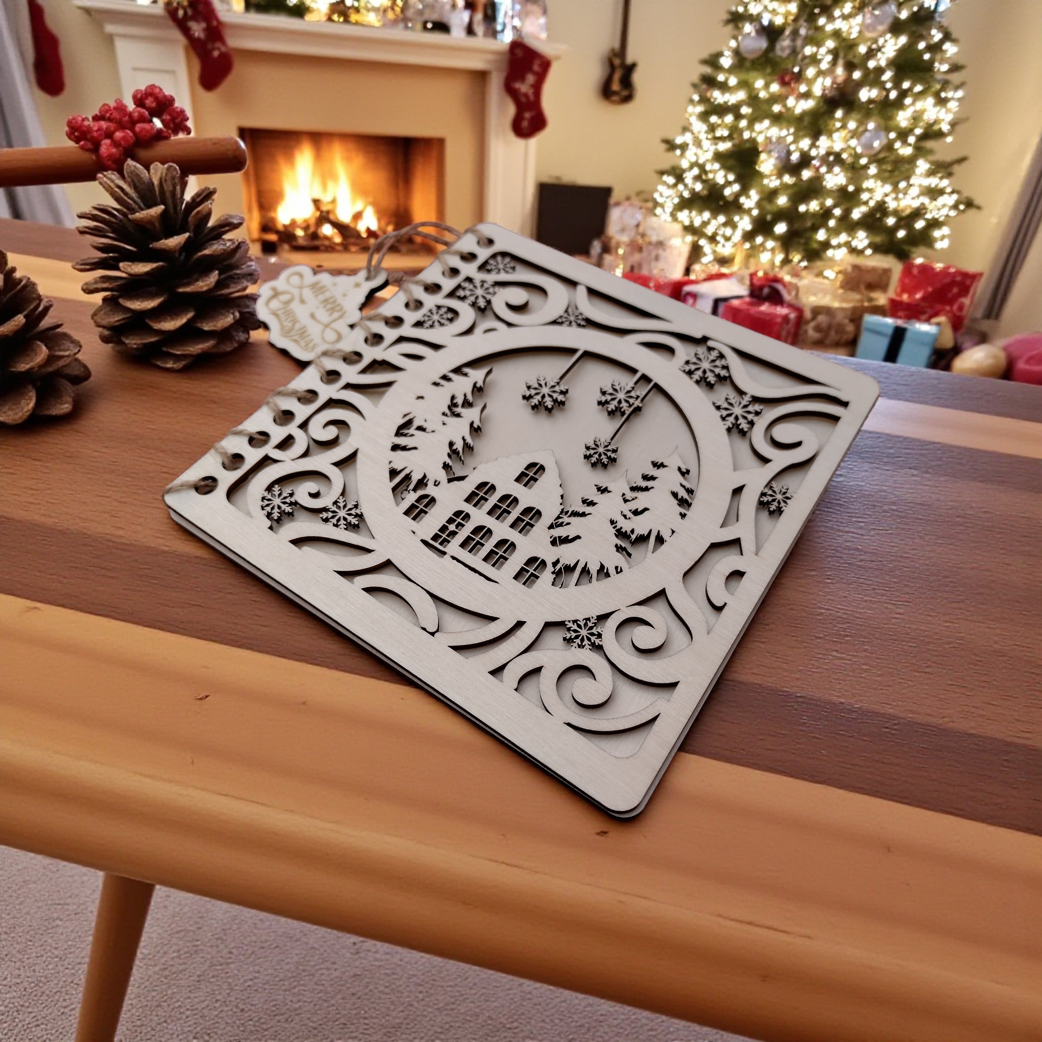 Alt: Close-up of laser-cut snowflakes and swirls on eco-friendly birch wood Christmas greeting card – CraftRay Gifts.
