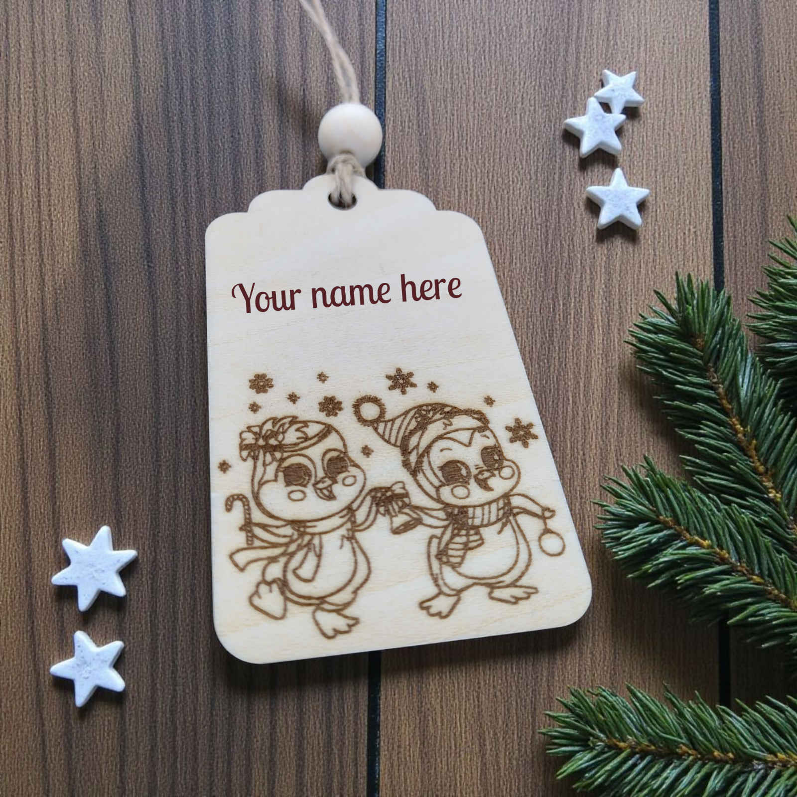 Cute engraved wooden penguins gift tag for Christmas presents – handmade personalised tag by CraftRay Gifts.