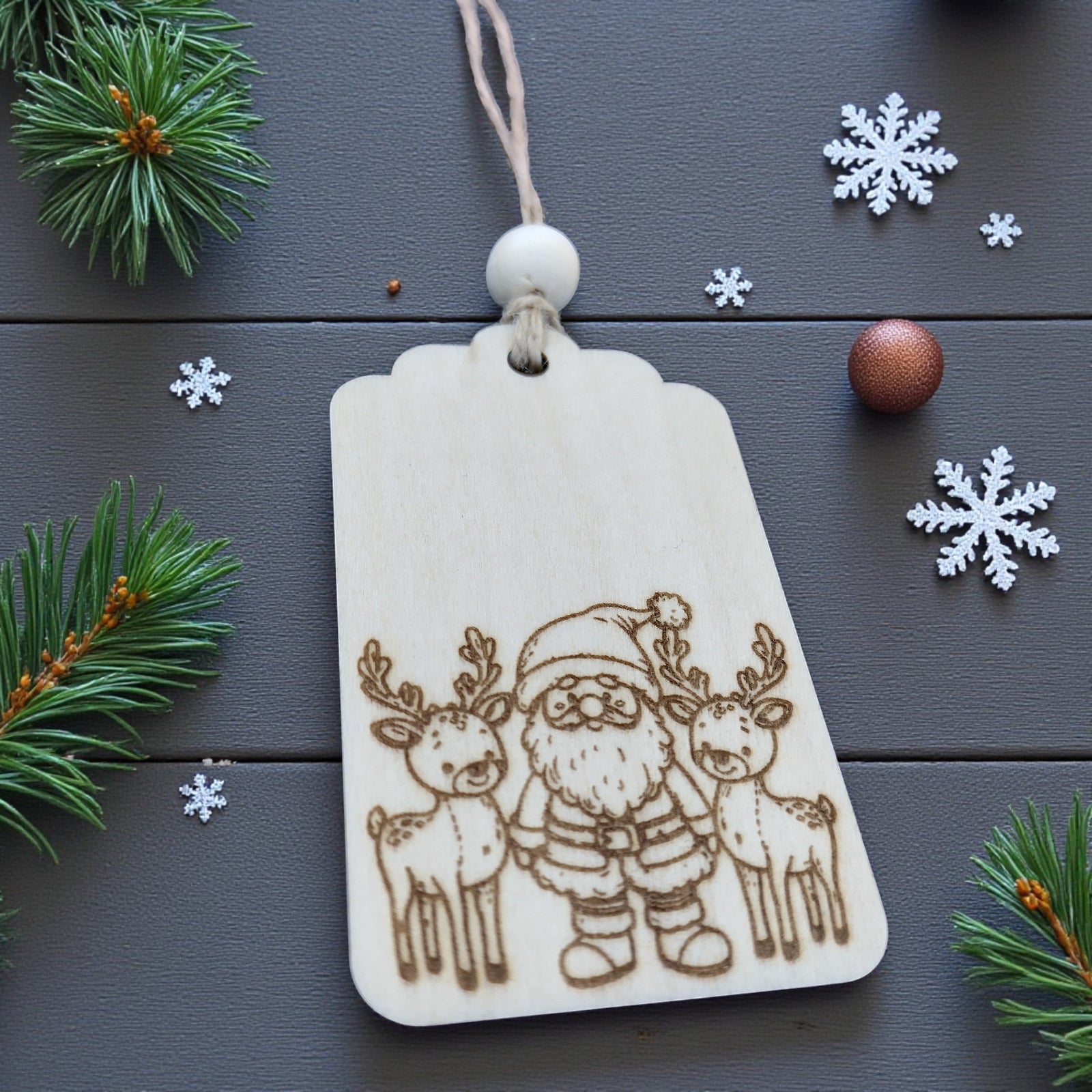 Personalised Santa and reindeer wooden gift tag, engraved for Christmas presents by CraftRay Gifts.